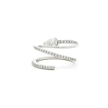 This 18K White Gold ring showcases a pear-cut diamond, set in a serpent-shaped band adorned with sparkling diamonds. A timeless design with a touch of modern artistry!