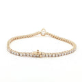14K Yellow Gold Pear-Cut Bezel-Set Lab-Grown Diamond Tennis Bracelet

An elegant tennis bracelet showcasing a seamless line of Round-cut Lab-Grown Diamonds, accented by a captivating Pear center stone in a bezel setting. Crafted in 14K Yellow Gold, this piece embodies exquisite craftsmanship as the warm gold enhances the radiance of every diamond. The bezel-framed pear center creates a modern focal point within a timeless silhouette, making it perfect for everyday luxury or special occasions. 