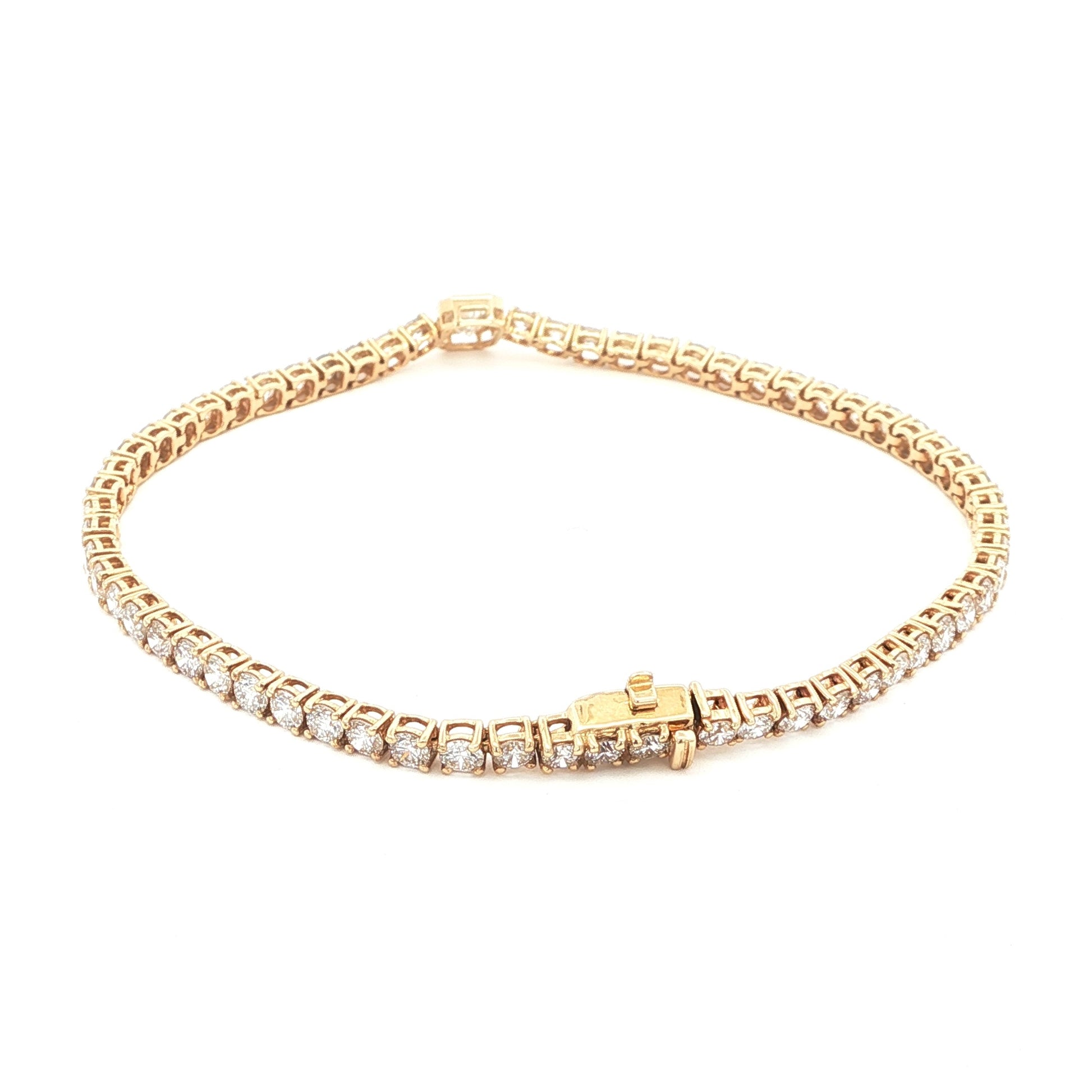 14K Yellow Gold Radiant-Cut Bezel-Set Lab-Grown Diamond Tennis Bracelet

Crafted in 14K Yellow Gold, this exquisite bracelet features a seamless line of Round-cut Lab-Grown Diamonds, with a Radiant-cut center stone bezel-set as its focal point. A modern take on a classic tennis bracelet, it delivers timeless elegance and brilliance for moments that matter!