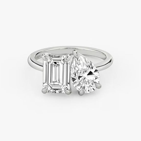 The Toi et Moi Emerald and Pear Engagement Ring