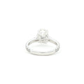 Oval cut lab grown diamond ring with pavé set accent band in 18k white gold. 