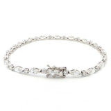 18K White Gold Marquise and Round Cut Lab Grown Diamond Bracelet 

A modern take on the classic tennis bracelet. This 18K White Gold bracelet features marquise and round-cut diamonds in a clean geometric design. The contrast of shapes creates subtle movement and light play.