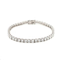 18K White Gold Brilliant Round Cut Lab-Grown Diamond Tennis Bracelet. 

This 18K White Gold is the ultimate classic—endless rounds of brilliant-cut diamonds set in a seamless flow of sparkle. Perfect for those who appreciate timeless elegance with effortless versatility.
