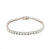 18K White Gold Brilliant Round Cut Lab-Grown Diamond Tennis Bracelet. 

This 18K White Gold is the ultimate classic- endless rounds of brilliant-cut diamonds set in a seamless flow of sparkle. Perfect for those who appreciate timeless elegance with effortless versatility.
