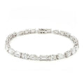 18K White Gold, Fancy Shape, Baguette, Pear, and Oval-Cut Tennis Bracelet 

Crafted in 18K White Gold, this exquisite tennis bracelet showcases an alternating pattern of Baguette, Pear, and Oval-Cut Lab-Grown Diamonds. Meticulous craftsmanship shines through each prong-set facet, delivering a rhythmic, multidimensional sparkle from every angle. This modern blend of three shapes creates a timeless yet contemporary elegance, perfect for elevating moments that deserve to shine. 