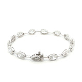 18K White Gold Fancy Shape Pear, Oval, and Princess-Cut Bezel-Set Lab-Grown Diamond Bracelet 

A chic, architectural pattern of bezel-set Pear, Oval, and Princess-Cut Lab-Grown Diamonds, each stone distinctly separated along the bracelet. Timelessly luminous and versatile -  perfect for elevating everyday looks or pairing with evening wear.
