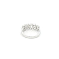 Pear cut lab grown diamond ring in half eternity style, 18k white gold.
