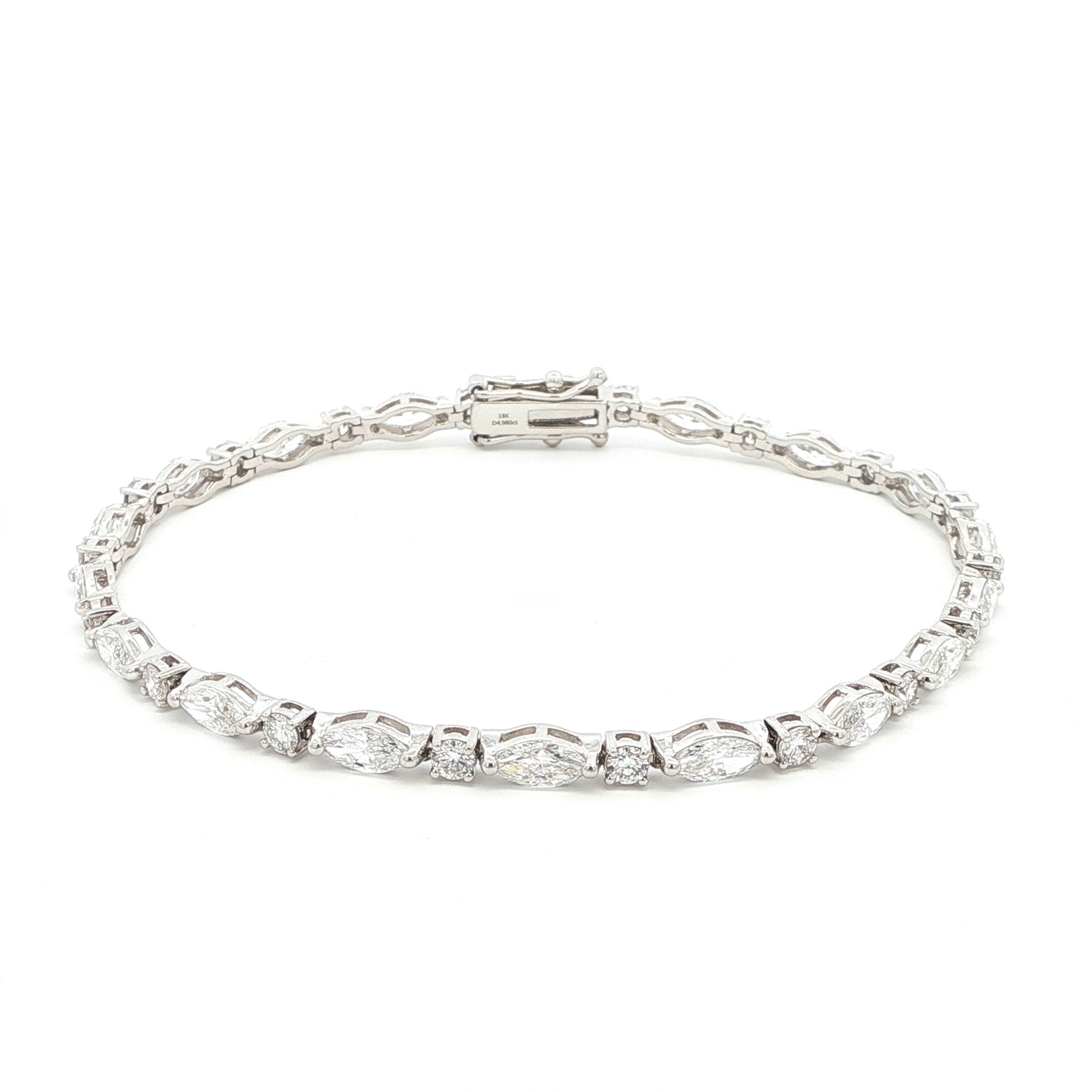 18K White Gold Marquise and Round Cut Lab Grown Diamond Bracelet 

A modern take on the classic tennis bracelet. This 18K White Gold bracelet features marquise and round-cut diamonds in a clean geometric design. The contrast of shapes creates subtle movement and light play.