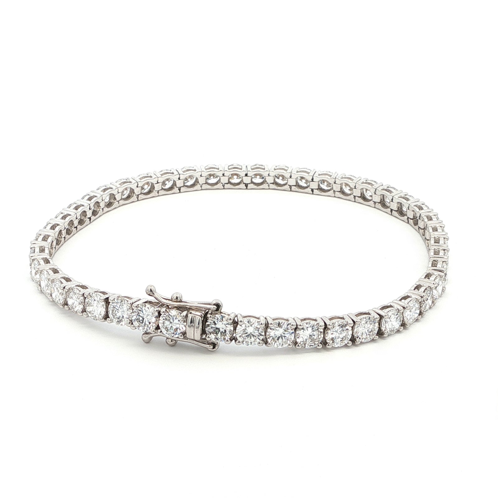 18K White Gold Round-Cut Lab-Grown Diamond Tennis Bracelet 

This 18K White Gold is the ultimate classic- endless rounds of brilliant-cut diamonds set in a seamless flow of sparkle. Perfect for those who appreciate timeless elegance with effortless versatility.