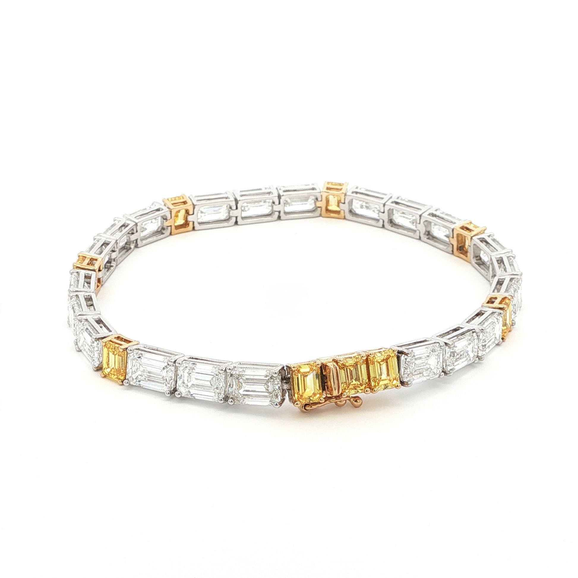 18K White & Yellow Gold Emerald-Cut Lab-Grown Diamond Tennis Bracelet 

An endless line of emerald-cut diamonds—white stones encircle the tennis-band, interspersed by six yellow emerald-cut accents. Set in a dual-tone 18K White and Yellow Gold setting, it delivers seamless sparkle and modern luxury for every occasion.