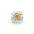 The sunflower-inspired Lumine ring is crafted in 18K tri-color gold (White, Yellow, and Rose Gold). At the centre is a fancy yellow cushion-cut diamond set in Yellow Gold. Surrounding it is a halo of pink diamonds set in Rose Gold. Completing the bloom are 