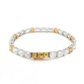 18K White & Yellow Gold Emerald-Cut Lab-Grown Diamond Tennis Bracelet 

An endless line of emerald-cut diamonds—white stones encircle the tennis-band, interspersed by six yellow emerald-cut accents. Set in a dual-tone 18K White and Yellow Gold setting, it delivers seamless sparkle and modern luxury for every occasion.