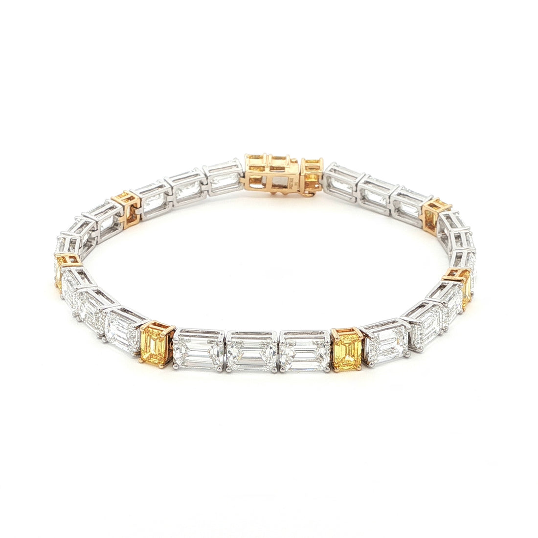 18K White & Yellow Gold Emerald-Cut Lab-Grown Diamond Tennis Bracelet 

An endless line of emerald-cut diamonds—white stones encircle the tennis-band, interspersed by six yellow emerald-cut accents. Set in a dual-tone 18K White and Yellow Gold setting, it delivers seamless sparkle and modern luxury for every occasion.