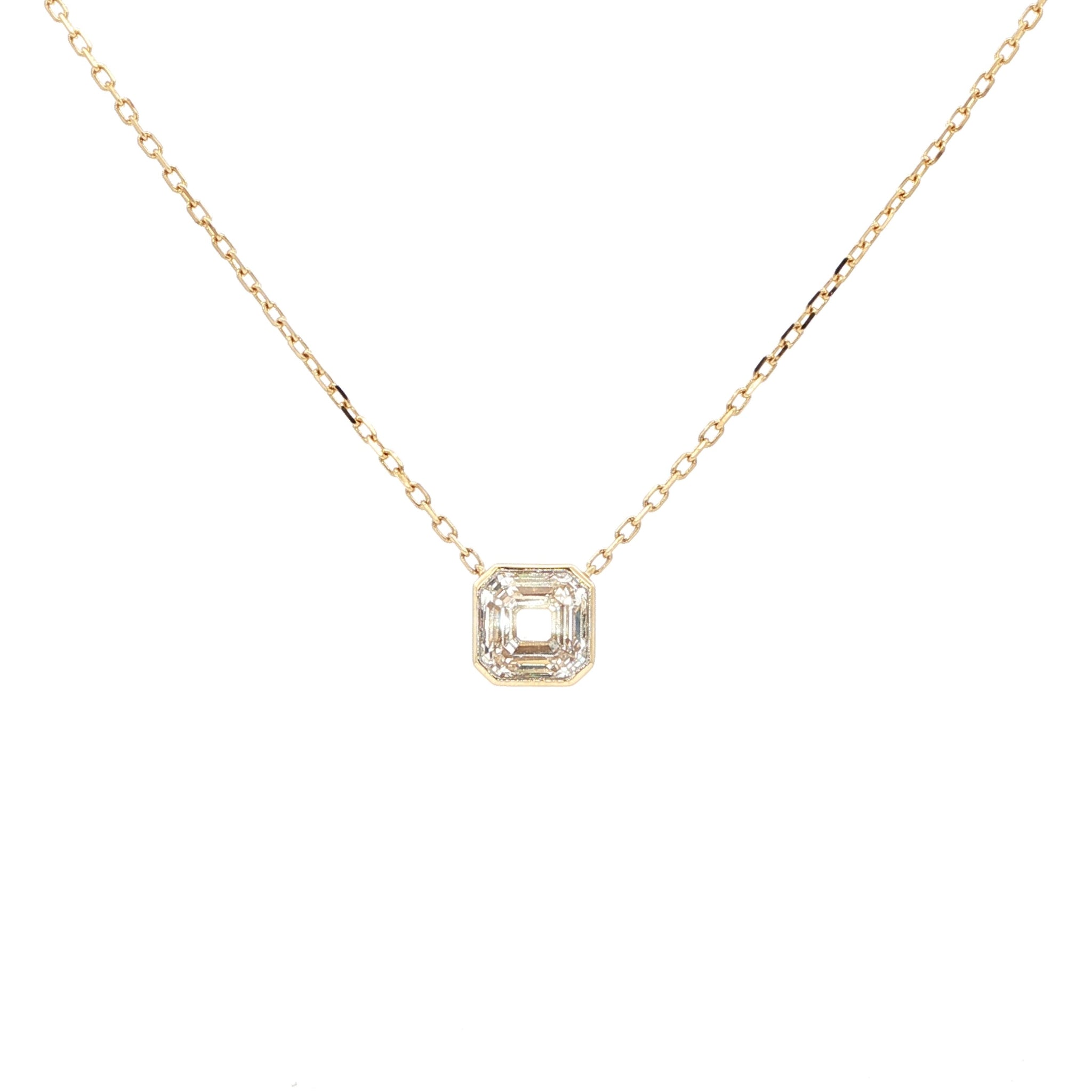 Lab-grown asscher diamond pendant necklace in 18k yellow gold, bezel set. 