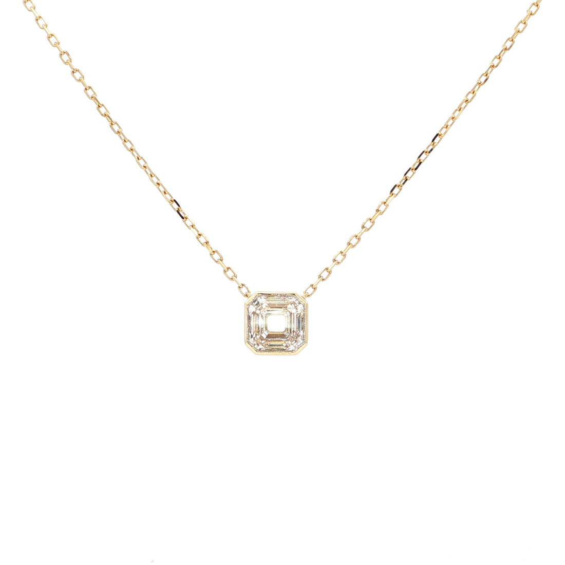 Lab-grown asscher diamond pendant necklace in 18k yellow gold, bezel set. 
