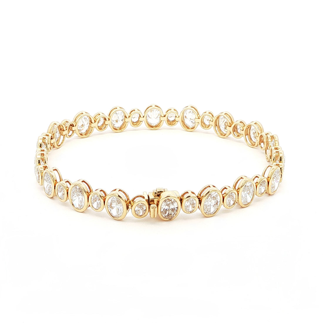 18K Yellow Gold Oval Cut Bezel Set Lab-Grown Diamond Bracelet

A seamless line of Oval-cut Lab-Grown Diamonds, alternating between small and larger stones, forms this exquisite tennis bracelet. Crafted in 18K Yellow Gold, each diamond is securely bezel-set to maximize sparkle and preserve a clean, continuous glow. Timeless yet contemporary, this bracelet pairs modern brilliance with everyday luxury, making it the perfect addition to your jewelry collection.