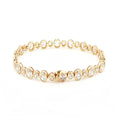 18K Yellow Gold Oval Cut Bezel Set Lab-Grown Diamond Bracelet

A seamless line of Oval-cut Lab-Grown Diamonds, alternating between small and larger stones, forms this exquisite tennis bracelet. Crafted in 18K Yellow Gold, each diamond is securely bezel-set to maximize sparkle and preserve a clean, continuous glow. Timeless yet contemporary, this bracelet pairs modern brilliance with everyday luxury, making it the perfect addition to your jewelry collection.