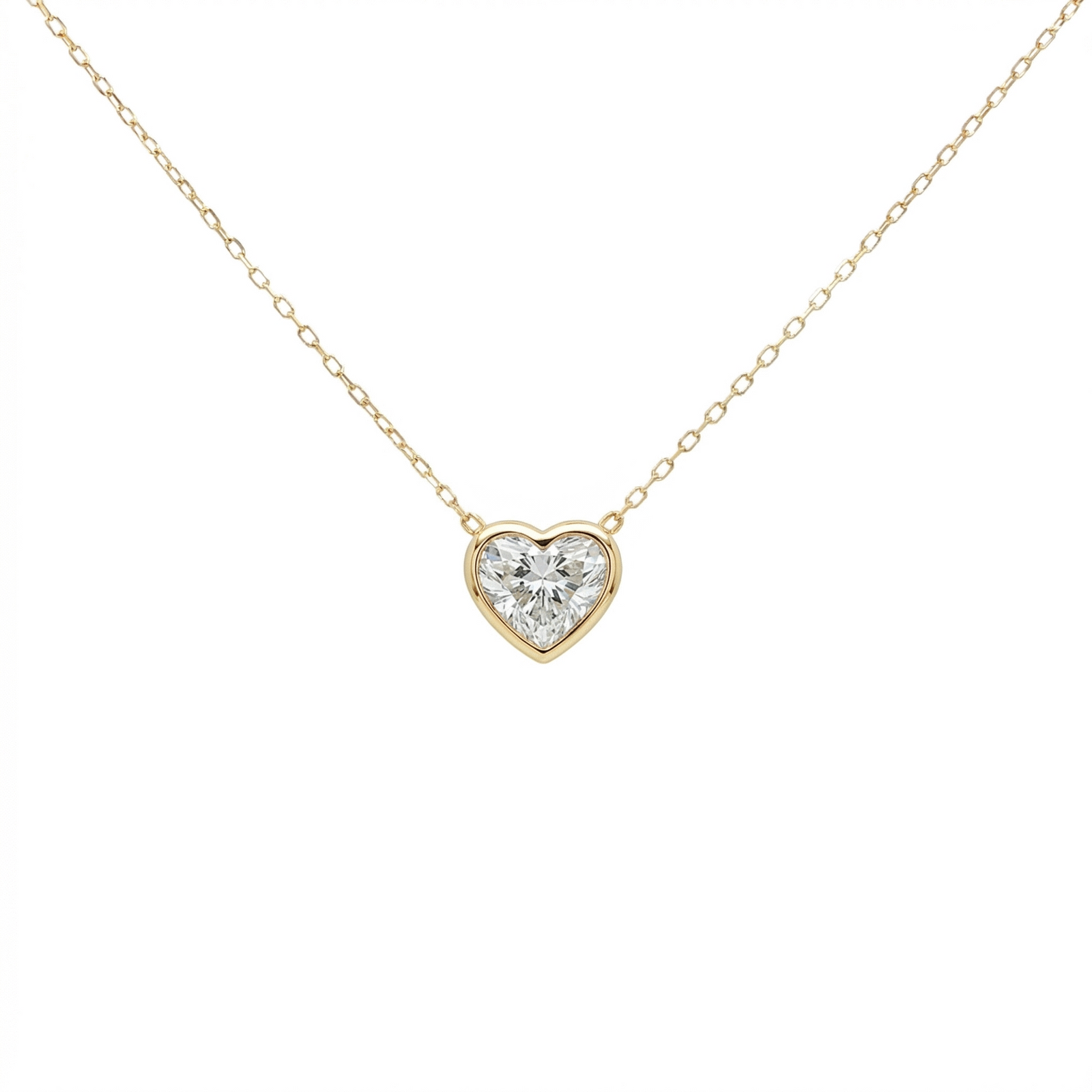 Lab-grown fancy heart diamond pendant necklace in 18k yellow gold, bezel set.