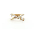 This 18K Yellow Gold ring features a unique cross wrap design adorned with Marquise and Pavé diamonds. The intricate detailing and elegant curves make it a perfect accessory for any occasion, whether it's a formal event or a casual outing. 