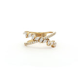 This 18K Yellow Gold ring features a unique cross wrap design adorned with Marquise and Pavé diamonds. The intricate detailing and elegant curves make it a perfect accessory for any occasion, whether it's a formal event or a casual outing.&nbsp;
