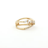 This 18K Yellow Gold ring features a unique cross wrap design adorned with Marquise and Pavé diamonds. The intricate detailing and elegant curves make it a perfect accessory for any occasion, whether it's a formal event or a casual outing.