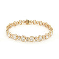 18K Yellow Gold Oval Cut Bezel Set Lab-Grown Diamond Bracelet

A seamless line of Oval-cut Lab-Grown Diamonds, alternating between small and larger stones, forms this exquisite tennis bracelet. Crafted in 18K Yellow Gold, each diamond is securely bezel-set to maximize sparkle and preserve a clean, continuous glow. Timeless yet contemporary, this bracelet pairs modern brilliance with everyday luxury, making it the perfect addition to your jewelry collection.