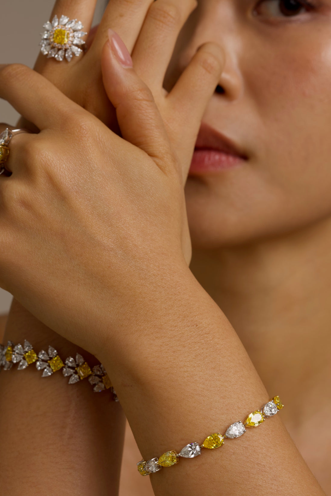18K White and Yellow Gold Duo-Tone Pear-Cut Lab-Grown Diamond Bracelet

A bold, duo-tone bracelet that showcases Pear-cut diamonds in an alternating pattern of white and yellow stones. Each diamond is securely held in place by a refined three-prong design, with white diamonds set in white gold and yellow stones in yellow gold. Crafted in a sophisticated combination of 18K White and Yellow Gold, this bracelet offers modern luxury for any occasion.