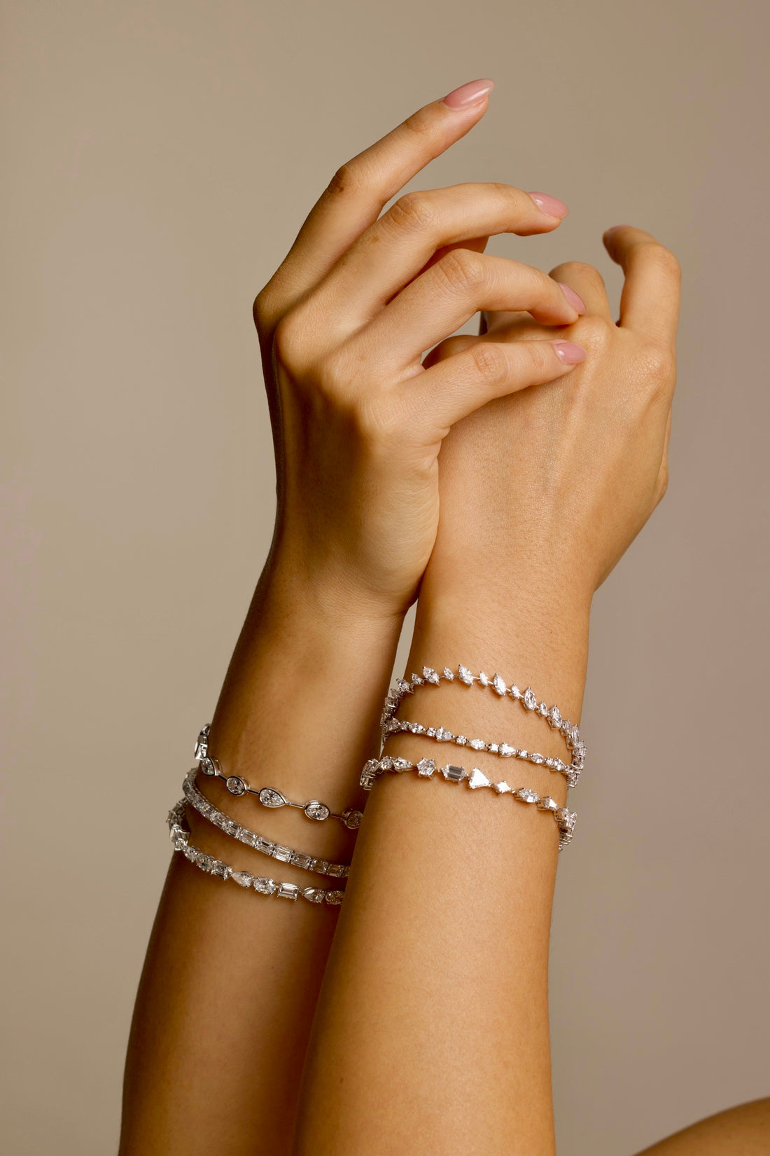18K White Gold, Fancy Shape, Baguette, Pear, and Oval-Cut Tennis Bracelet 

Crafted in 18K White Gold, this exquisite tennis bracelet showcases an alternating pattern of Baguette, Pear, and Oval-Cut Lab-Grown Diamonds. Meticulous craftsmanship shines through each prong-set facet, delivering a rhythmic, multidimensional sparkle from every angle. This modern blend of three shapes creates a timeless yet contemporary elegance, perfect for elevating moments that deserve to shine. 