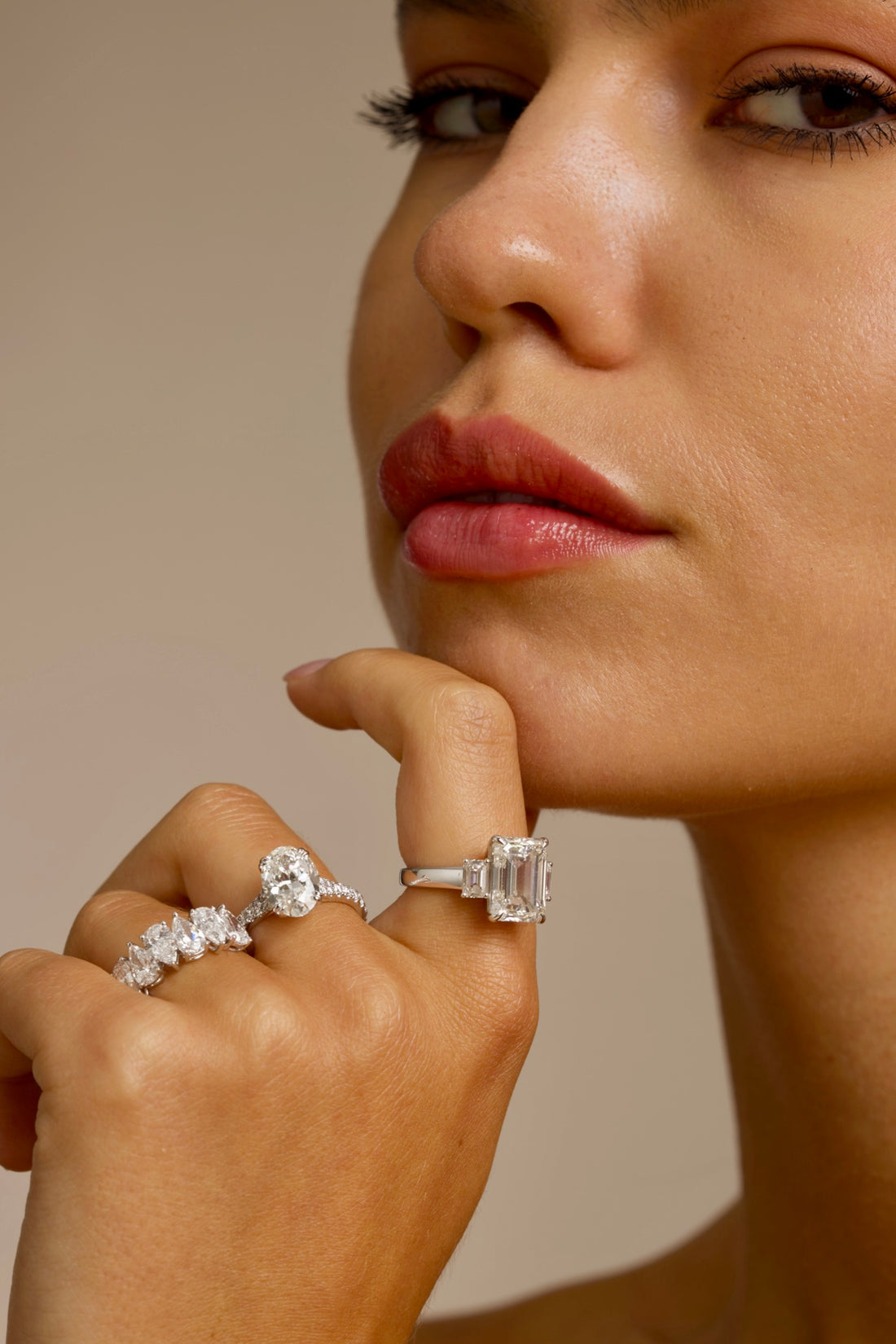 Oval cut lab grown diamond ring with pavé set accent band in 18k white gold. 