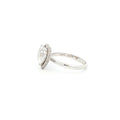 Crafted in 18K White Gold, this ring features a brilliant heart-shaped lab-grown diamond embraced by a glittering halo. Beneath the centre stone, a hidden halo adds an extra tier of light, the double-halo effect creates depth and radiance, making this ring a true statement of elegance.