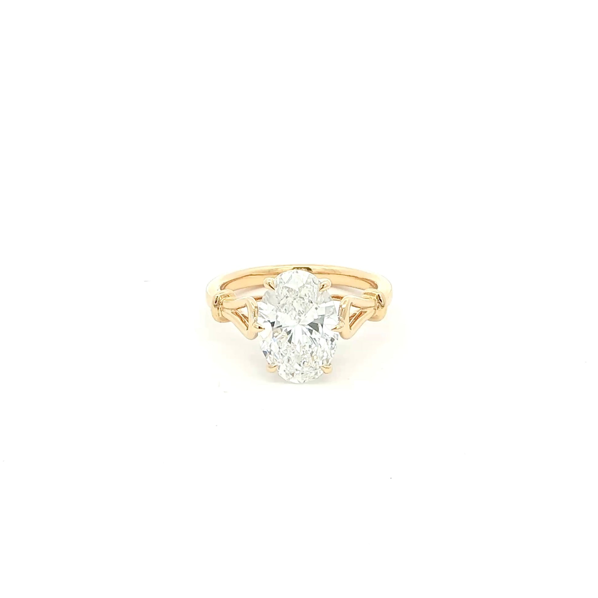 Oval solitaire lab-grown diamond ring in tapered cathedral setting, 18k yellow gold. 