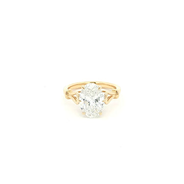 Oval solitaire lab-grown diamond ring in tapered cathedral setting, 18k yellow gold. 
