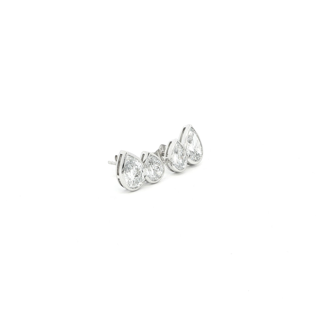 Pear lab grown diamond stud earrings in bezel set, toi et moi style