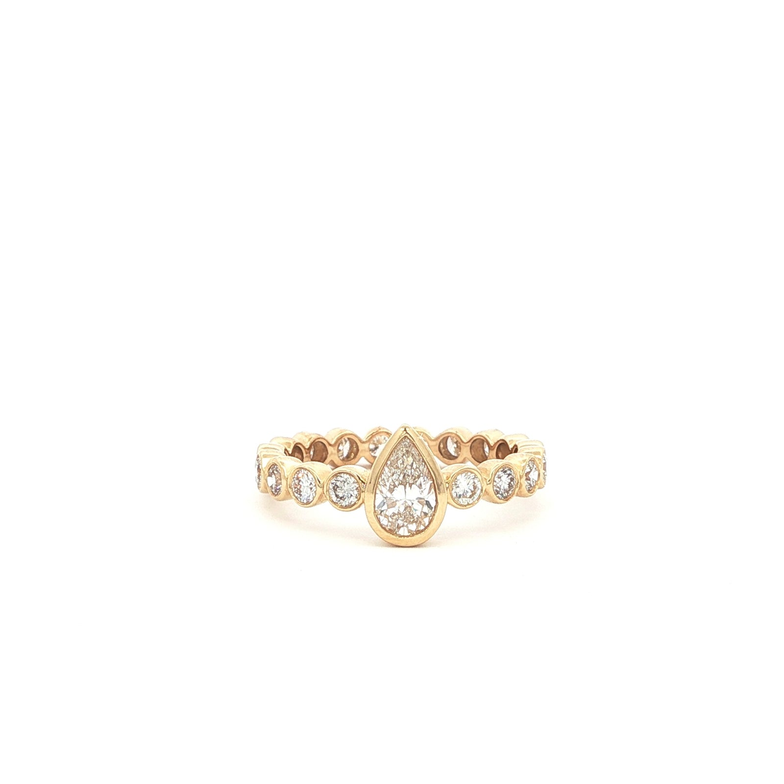 Pear lab-grown diamond ring in bezel setting, 14k yellow gold. 