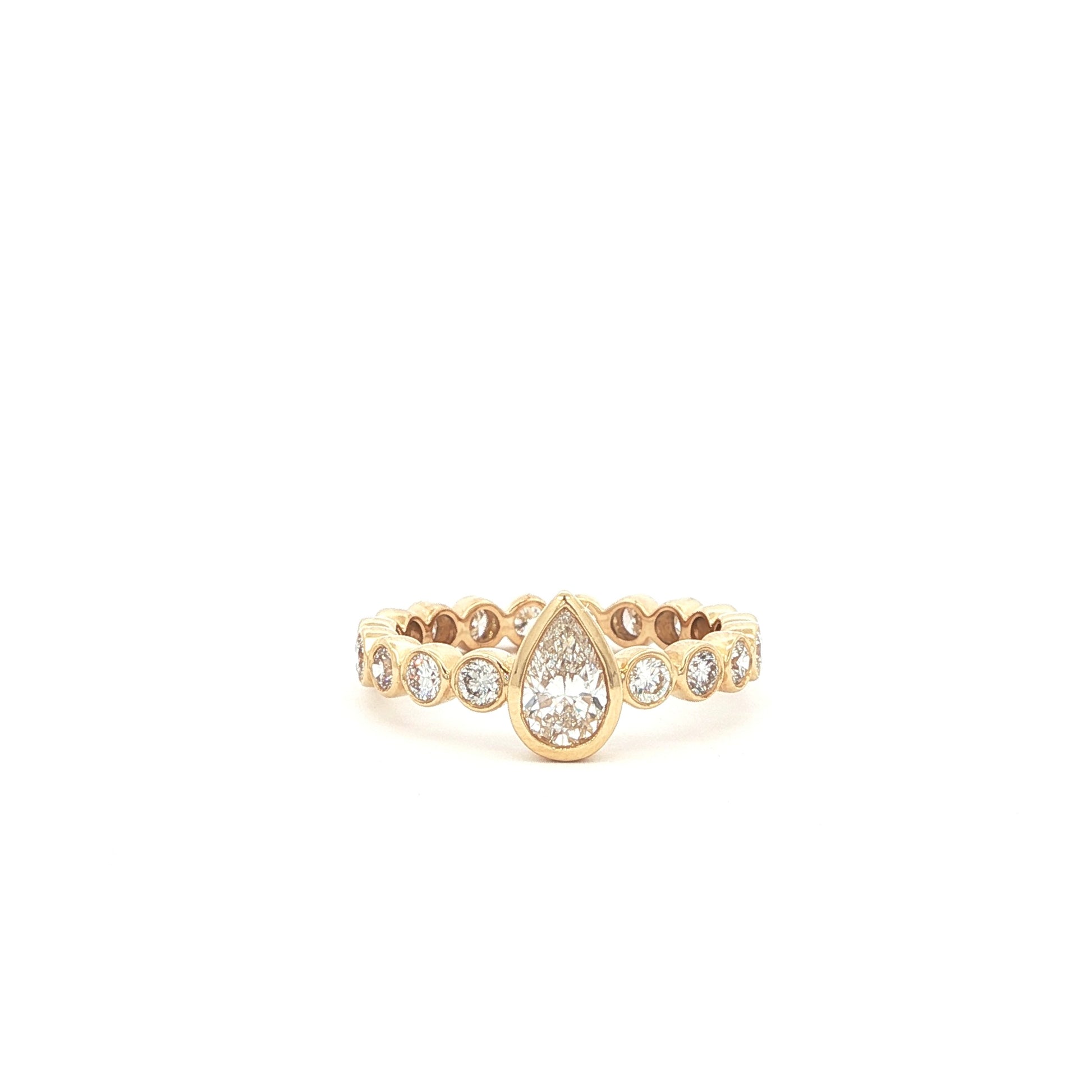 Pear lab-grown diamond ring in bezel setting, 14k yellow gold. 