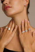 Pear cut lab grown diamonds in 18k white gold, half eternity with delicate band