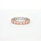 Two-tone ring with pink and silver stones on a white background