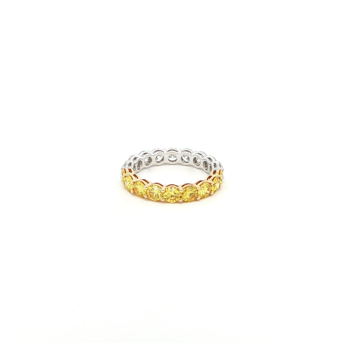 Luxury two-tone eternity band in 18K white and rose gold with round yellow and white diamonds