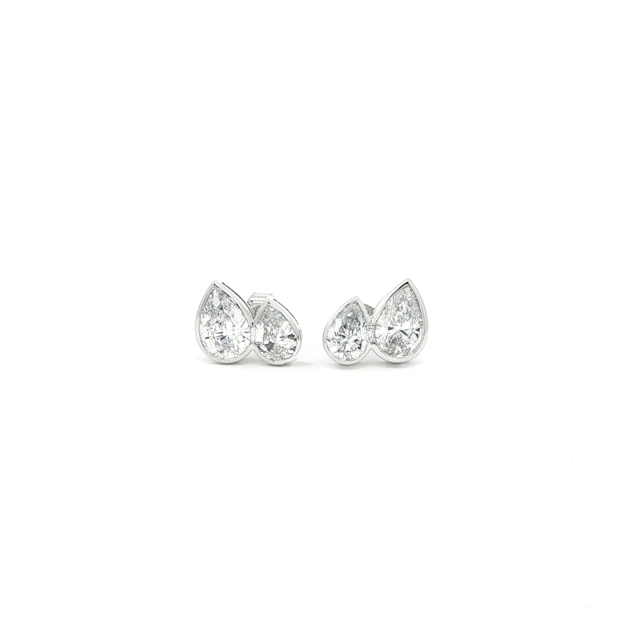 Pear lab grown diamond stud earrings in bezel set, toi et moi style