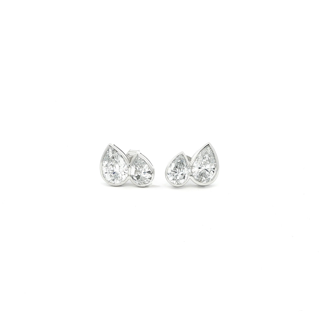 Pear lab grown diamond stud earrings in bezel set, toi et moi style