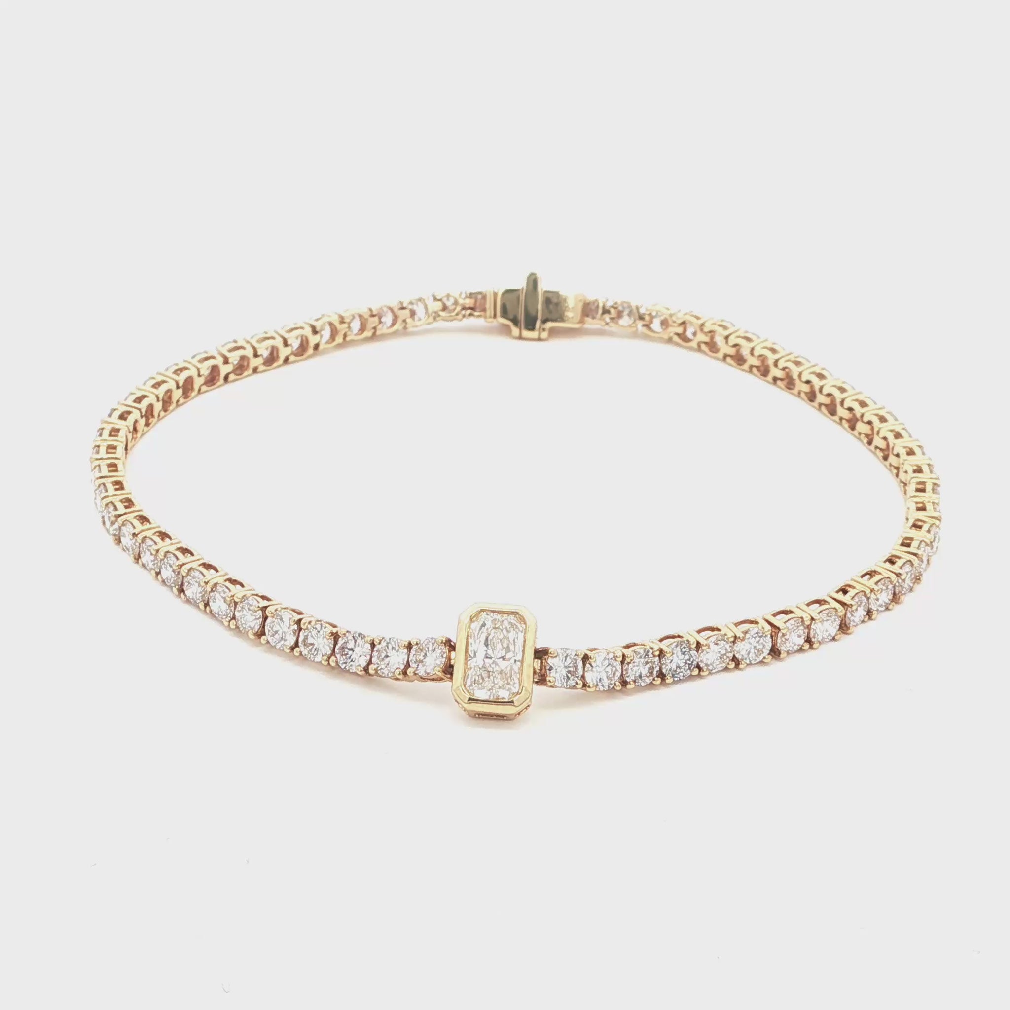 14K Yellow Gold Radiant-Cut Bezel-Set Lab-Grown Diamond Tennis Bracelet

Crafted in 14K Yellow Gold, this exquisite bracelet features a seamless line of Round-cut Lab-Grown Diamonds, with a Radiant-cut center stone bezel-set as its focal point. A modern take on a classic tennis bracelet, it delivers timeless elegance and brilliance for moments that matter!