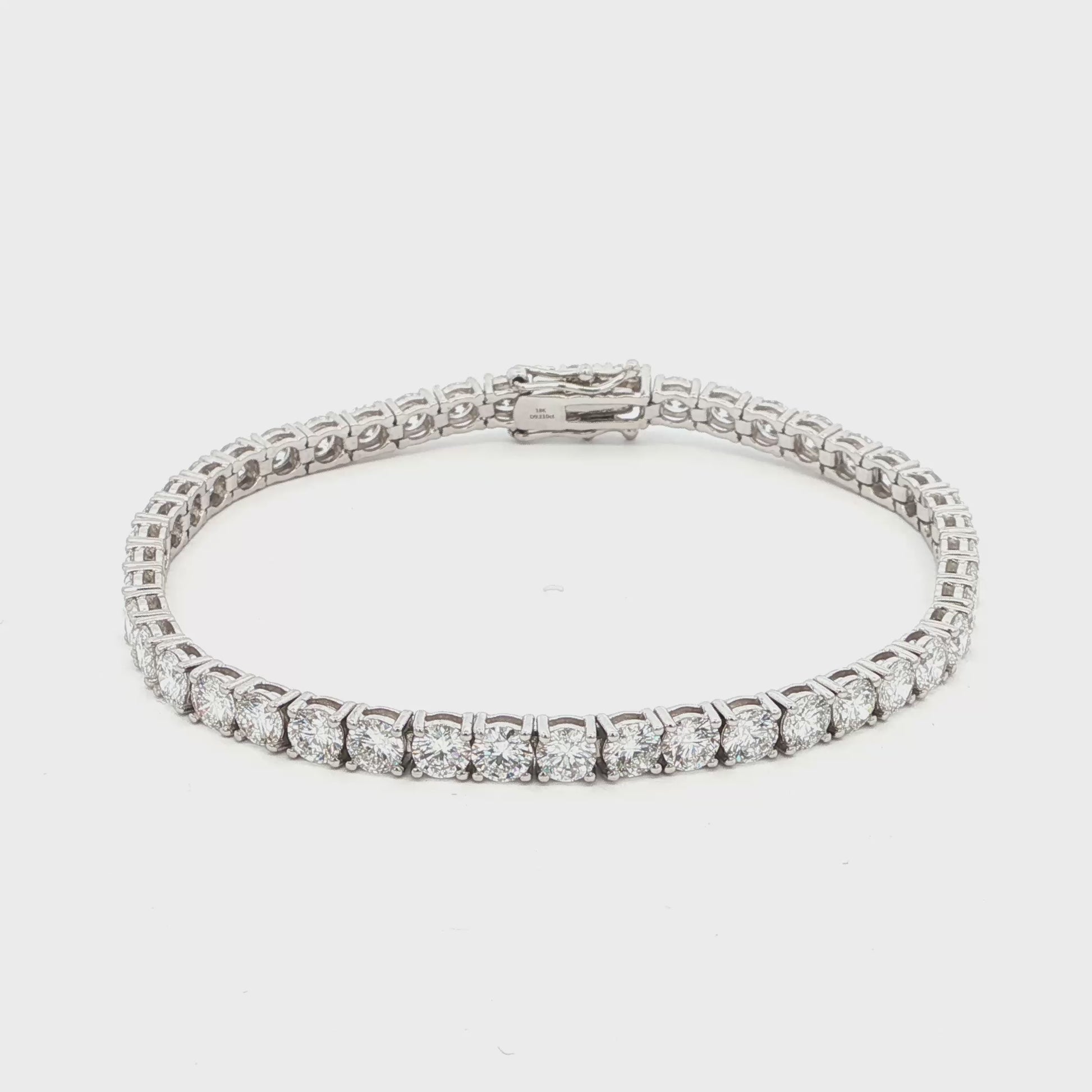 18K White Gold Brilliant Round-Cut Lab-Grown Diamond Tennis Bracelet 

This 18K White Gold is the ultimate classic—endless rounds of brilliant-cut diamonds set in a seamless flow of sparkle. Perfect for those who appreciate timeless elegance with effortless versatility.