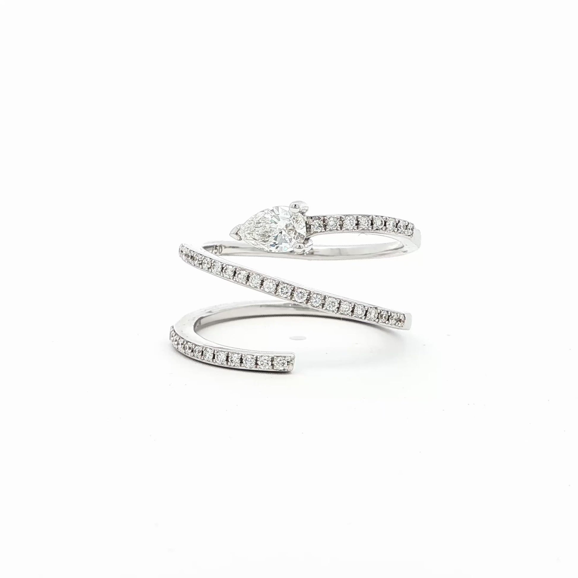18K_White_Gold_Pear_Cut_Pave_Lab_Grown_Diamond_Ring_Serpent_Cocktail_Statement_Everyday_Evening

This 18K White Gold ring showcases a pear-cut diamond, set in a serpent-shaped band adorned with sparkling diamonds. A timeless design with a touch of modern artistry!