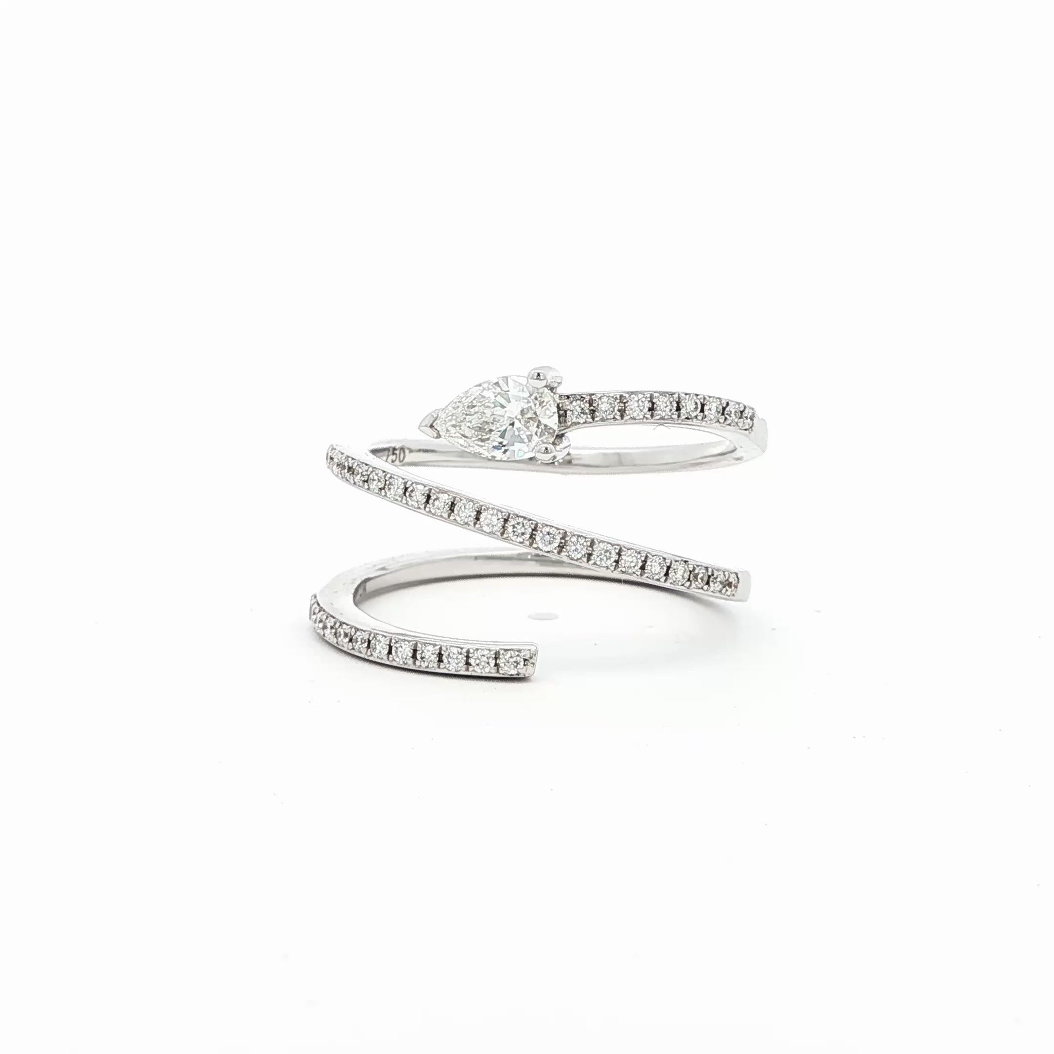 18K_White_Gold_Pear_Cut_Pave_Lab_Grown_Diamond_Ring_Serpent_Cocktail_Statement_Everyday_Evening

This 18K White Gold ring showcases a pear-cut diamond, set in a serpent-shaped band adorned with sparkling diamonds. A timeless design with a touch of modern artistry!