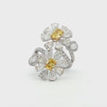 18K_White_Gold_Floral_Lab_Grown_Diamond_Ring_Fancy_Yellow_Cocktail_Everyday_Evening

This 18K White Gold ring features a floral-inspired design with two oval-cut fancy yellow diamonds, expertly cut in a brilliant style. These radiant gems are accented by white diamond 
