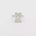 Radiant cut lab-grown diamond solitaire ring set in 18K white gold band, timeless engagement design.