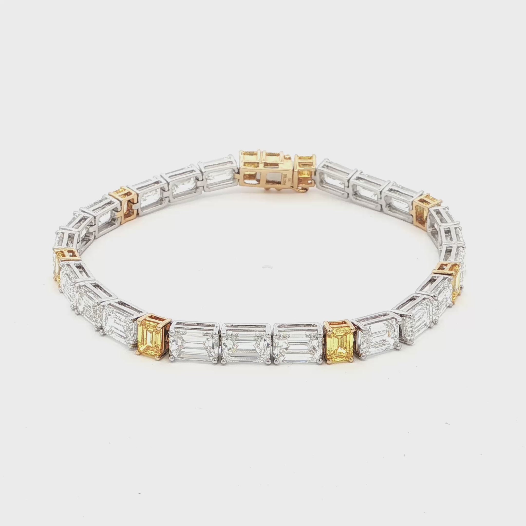 18K White & Yellow Gold Emerald-Cut Lab-Grown Diamond Tennis Bracelet 

An endless line of emerald-cut diamonds—white stones encircle the tennis-band, interspersed by six yellow emerald-cut accents. Set in a dual-tone 18K White and Yellow Gold setting, it delivers seamless sparkle and modern luxury for every occasion.