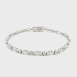 18K White Gold Marquise and Round Cut Lab-Grown Diamond Bracelet 

A modern take on the classic tennis bracelet. This 18K White Gold bracelet features marquise and round-cut diamonds in a clean geometric design. The contrast of shapes creates subtle movement and light play.