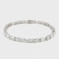 18K White Gold, Fancy Shape, Baguette, Pear, and Oval Cut Tennis Bracelet 

Crafted in 18K White Gold, this exquisite tennis bracelet showcases an alternating pattern of Baguette, Pear, and Oval-Cut Lab-Grown Diamonds. Meticulous craftsmanship shines through each prong-set facet, delivering a rhythmic, multidimensional sparkle from every angle. This modern blend of three shapes creates a timeless yet contemporary elegance, perfect for elevating moments that deserve to shine. 