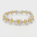 Lab-grown diamond bracelet with a yellow diamond. Made in 18k yellow gold and white gold. Occasion wear. 